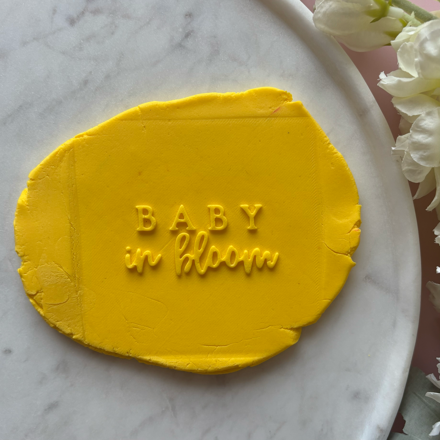Baby in Bloom Debosser on yellow fondant