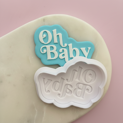 Silicone mold with 'Oh Baby' text on a pink background