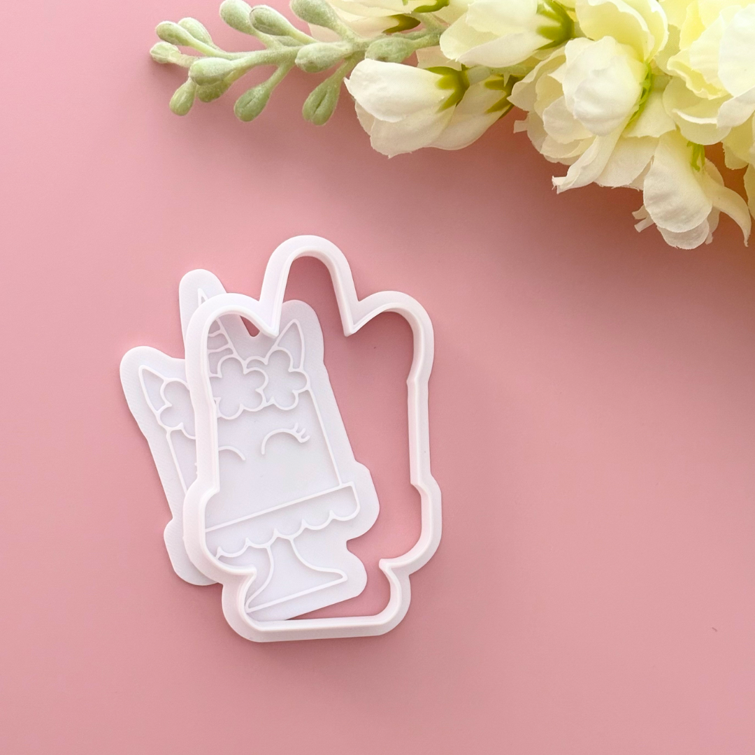 unicorn cake with flowers cookie cutter and stamp