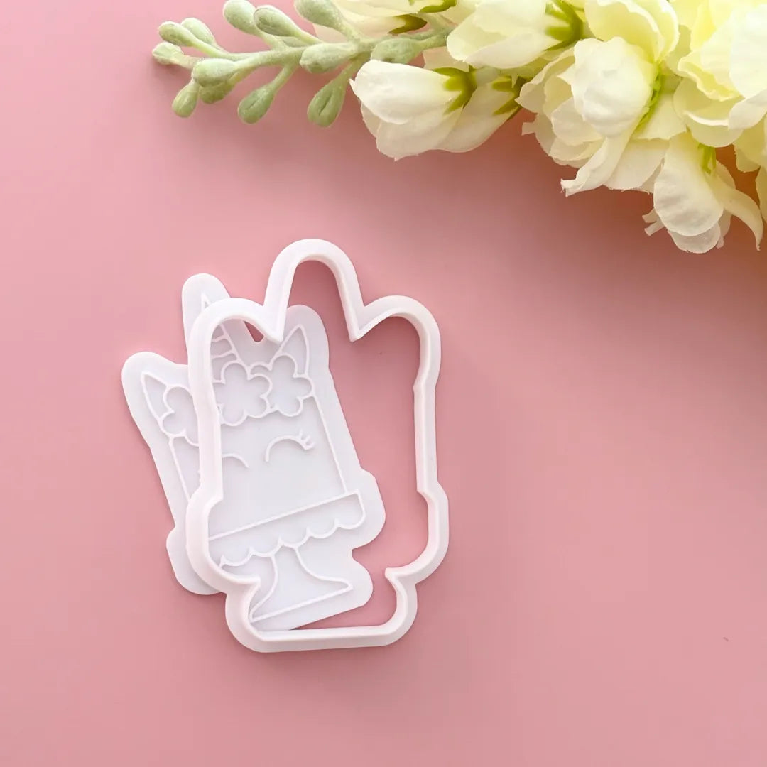 unicorn cake with flowers cookie cutter and stamp
